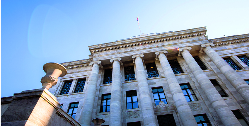 Marble building (Gordon Hall) with pillars.